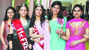 Crowned beauties strike a pose during freshers party held at the BD Arya Girls College in Jalandhar Cantt on Tuesday.