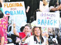 Two delegates cheer at the 2008 Democratic National Convention in Denver, Colorado,
