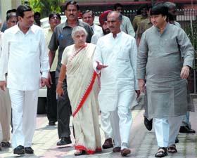 DPCC president Jai Prakash Aggarwal with Delhi Chief Minister Sheila Dikshit and ministers Raj Kumar Chauhan, Arvinder Singh Lovely and Haroon Yusuf after a meeting with the chief election commissioner on the issue of voter I-cards in New Delhi