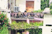 Army personnel take up positions to storm the house where armed terrorists had taken shelter in the Chinore area of Bantalab in Jammu on Wednesday