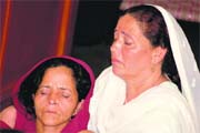 a relative consoles the widow of the subedar killed in the shootout