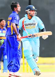 Virat Kohli runs between the wickets during the fourth ODI match