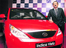 Nitin Seth, head, car products group, poses with the new Indica Vista that was launched in the city on Thursday. The car is priced between Rs 3.51 lakh and Rs 4.89 lakh.