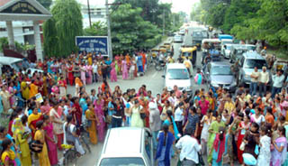 GCG girls block traffic outside the college in Patiala on Thursday.