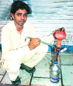 Harish Ahlawat with his battery-operated hookah.