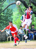 The final match between Sanawar XI and Sherwood XI in progress at the football ground, Lawrence School, Sanawar