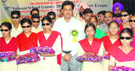 Visually challenged sportspersons being honoured on National Sports Day at Government College for Girls, Sector 11, Chandigarh, on Friday.