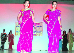 Students of Guru Nanak Girls College walk on a ramp during the Miss Fresher contest in Ludhiana on Friday. 
