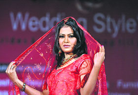 A model presents a creation by Pakistani designer Sadaf Rameez at an exhibition of Wedding Style 2008 in Karachi on Saturday.