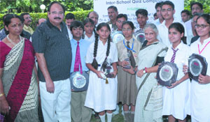 Delhi CM Sheila Dikshit and Dr A.K. Walia with the winners of the inter-school quiz competition organised by BSES Bijli Gyan Abhiyan at a function in New Delhi on Saturday.