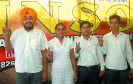 INSO candidates show the victory sign at a press conference in New Delhi on Saturday.