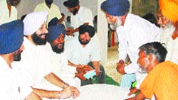 Information and public relations minister Bikram Singh Majithia conducts sangat darshan in Majitha