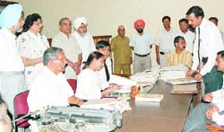 District and sessions judge-cum-DLSA chairman Gurdev Singh inspects a special lok adalat in Jalandhar