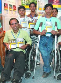 A group of disabled persons release the DVDs of special programmes of National Geographic channel in Delhi Book Fair-2008 at Pragati Maidan in New Delhi