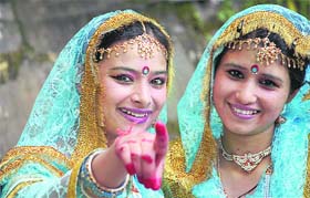 Students of Chapslee School wait for their turn to perform at the annual day function of the school in Shimla