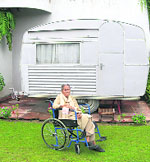 CARageous: After a bar-be-que at Kishie Singhs garage the caravan is the best place to relax in.