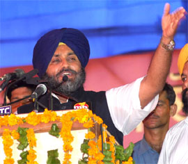 SAD chief Sukhbir Singh Badal addressing the rally after the laying of the foundation stone for the new thermal power plant of 1980 MW capacity at village Banwala in Mansa district on Tuesday. 