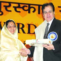 Veteran Bollywood actor Dilip Kumar receives the Lifetime Achievement Award for 2006 from President Pratibha Patil at the 54th National Film Awards function in New Delhi