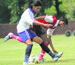 A match in progress during the ongoing 6th Administrator's Challenge Cup All-India Football Tournament at the Sector 42 football ground on Wednesday. 