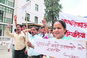 Vidya upasaks and assistant primary teachers from all over the state agitating in support of their demands in front of the state vidhan sabha in Shimla
