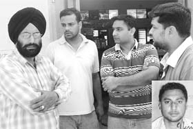 Relatives of Gurinder Singh (inset) wait for the post-mortem of the victim who died on Wednesday night
