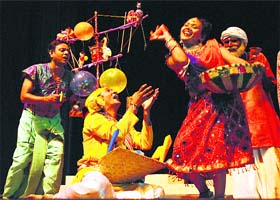 Artistes stage Andher Nagri during the national drama festival at Inderdhanush auditorium in Panchkula