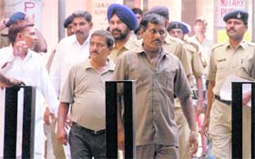 The accused being taken to Burail Jail in Chandigarh