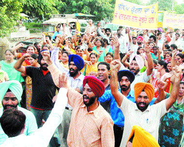 Members of the ETT Teachers Union hold a protest rally in Jalandhar.
