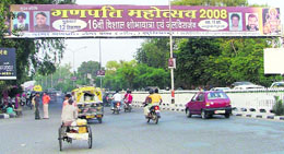 Those putting up hoardings without permission have not even spared the overhead indicator signboards in Ludhiana.