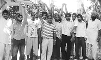 Villagers protest against power cuts in Rajpura on Friday.