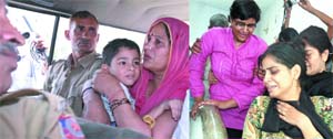 Constable Som Pal's sister-in-law and other relatives console his son at Model Town in North Delhi on Friday.