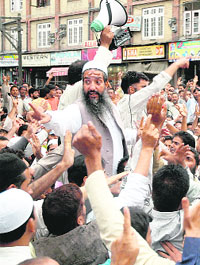 Kashmiri Muslims protest after the Friday prayers in Srinagar.