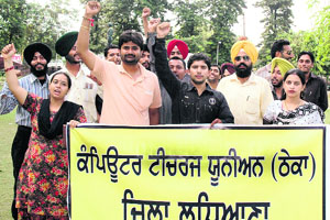 Members of the Computer Teachers Union protest against government apathy on Teachers Day in Ludhiana. 