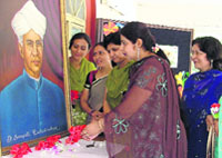 (From left) Teachers of GMT Public School pay homage to Dr S. Radhakrishnan; tiny tots dressed as teachers at Kiddies Paradise; and Sacred Heart Convent girls carry gifts for their teachers in Ludhiana on Friday.