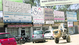 Mushrooming property dealers shops in Gurgaon. 