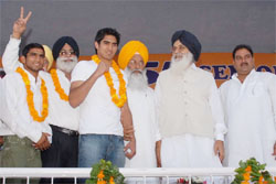 Chief Minister Parkash Singh Badal honouring Beijing boxing bronze medallist Vijender at the inaugural function of the 55th National Boxing Championship