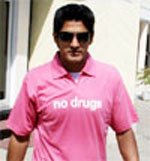 Olympic bronze medallist boxer Vijender poses during an anti-drug campaign in Bathinda