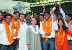 NSUI candidates for DUSU elections (from left wearing garlands) Amit Choudhry, Manohar Nagar, Ashish Gehlot and Sonia Sapra with Congress president Sonia Gandhi and general secretary Rahul Gandhi at her residence in New Delhi on Saturday. Amit Choudhry, Manohar Nagar and Ashish Gehlot won their seats while Sonia Sapra lost to ABVP presidential candidate Nupur Sharma. 