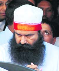 Dera Sacha Sauda head Gurmeet Ram Rahim Singh comes out of the CBI court in Ambala