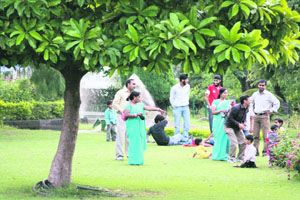 A family on a picnic at the Bag-e-Bahu garden in Jammu. 