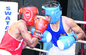 A second round bout between Krishna Barua of Meghalaya (Red) and Himanshu Shahu of SPSB at the Senior National Boxing Championship in Bathinda on Saturday. Himanshu won 18-8. 