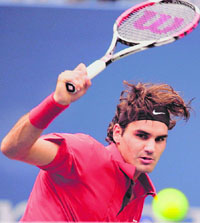 Roger Federer of Switzerland watches a return to Novak Djokovic of Serbia during the mens semis at the US Open on Saturday in New York. 