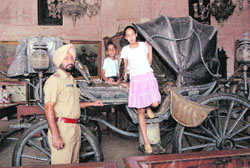 Children take a look at the baggi of the Maharaja at Qila Mubarak in Patiala 