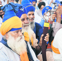 Votaries of a separate SGPC take part in a Sikh conference at Dera Karsewa in Karnal on Sunday. 