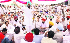MLA from Rampura Phul Gurpreet Singh Kangar addresses a gathering at Bhai Rupa village in Bathinda district