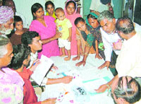 Children with disabilities being examined during a special medical assessment camp in Goraya on Monday.