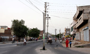 Electricity poles stand tall in the middle of the Bhatti road in Bathinda
