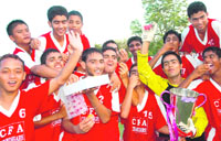 Players of the Chandigarh Football Academy in high spirits after bagging the 6th Administrators Challenge Cup All-India Football Tournament title at the Sector 17 Football Stadium on Tuesday.