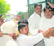 The supporters of the BJPs SC Morcha being rounded up by the police from Sector 22 Nehru Park, Chandigarh, on Tuesday.