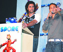 Bollywood actor Kunal Kapoor with VJ Nikhil Chinappa during the launch of EA's 'Spore Game' in New Delhi on Tuesday. 